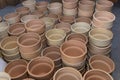 Stacks of various terracotta pots for plants. Royalty Free Stock Photo