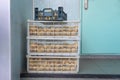 Stacks of vegetable boxes with harvested freshly potatoes.