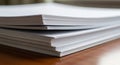 Stacks of white paper sheets rest Royalty Free Stock Photo
