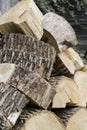 Stacks wood timber background. Pile of wood logs storage. Saws cut wood logs.