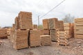 Stacks of wooden pallets. Industrial wooden pallets in stock. Concept of cargo transportation and shipping. Eco-friendly Royalty Free Stock Photo