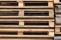 Stacks of Wooden pallets for industrial transportation by trucks