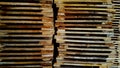 Stacks of wooden pallets, neatly lined up ready to use