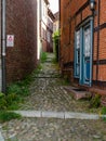 Stade, Germany - August 25, 2019: View at cobbled alley in historical part of Stade, Germany Royalty Free Stock Photo