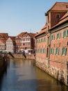 Stade, Germany - August 25, 2019: View at Schwinge River and historical Museum at the right Royalty Free Stock Photo