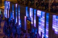 Stadtfest Brugg 24th of august 2019. street photography. Lilac and blue enlightened plastic wall of Kubus Kolor with people on the