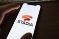 Stadia logo on the smartphone screen. Royalty Free Stock Photo