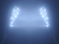 Stadium Floodlights against Dark Night Sky Royalty Free Stock Photo