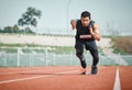 Stadium focus, man running and athlete on a runner and arena track for sprint race training. Fast, run and sports Royalty Free Stock Photo