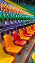 Stadium grandstand adorned with colorful rows of plastic seating