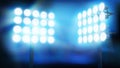 Stadium illuminated by floodlights. Vector illustration. Royalty Free Stock Photo