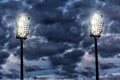 Stadium lights against dark night sky Royalty Free Stock Photo