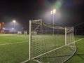 stadium in lights and flashes. Empty beautiful football field with glowing spotlights in the evening or at night Royalty Free Stock Photo