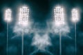 Stadium lights and smoke against dark night sky Royalty Free Stock Photo