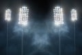 Stadium lights and smoke against dark night sky Royalty Free Stock Photo