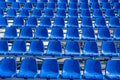 Stadium seats background. Rows of blue plastic empty chairs Royalty Free Stock Photo