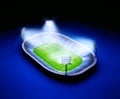 Stadium with soccer field with the lights on dark blue background