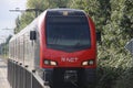 Stadler Flirt train of R-Net at station Waddinxveen heading to Gouda