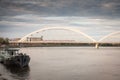 Stadler Kiss EMU passing by the Zezeljev most bridge over the danube on a Soko Voz Train service Royalty Free Stock Photo