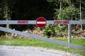 Staff entrance sign on private gate at workplace