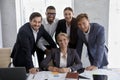 Staff in formal suits pose for corporate picture Royalty Free Stock Photo