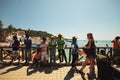 The staff greeted travelers arriving by ferry to the island of Phi Phi in Thailand