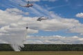 Staff of Ministry of Emergency Situations Spraying Water over Trees on MI-8 and MI-26 Helicopters During Aviation Sport Event