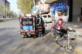 Staff of shunfeng express delivery goods on the roadside