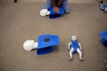 Staff training for CPR first aid with the AED. Royalty Free Stock Photo