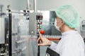 Staff workers working operate control machine in hygiene food factory Royalty Free Stock Photo