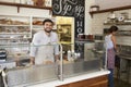 Staff working behind the counter at a sandwich bar Royalty Free Stock Photo