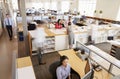 Staff working in a busy open plan office Royalty Free Stock Photo