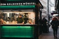 Staff working at the Zum Goldenen Wursten `The Golden Sausages` stand in Vienna, Austria.