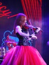 On stage - beautiful, frail and slender girl with fiery red hair - a well-known musician, virtuoso violinist Maria Bessonova.