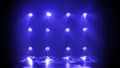 Stage blue lights shine on dark disco. Beams of spotlights illuminating an empty smoky stage in nightclub. Lighting Royalty Free Stock Photo