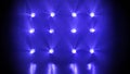 Stage blue lights shine on dark disco. Beams of spotlights illuminating an empty smoky stage in nightclub. Lighting Royalty Free Stock Photo