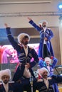 On stage are dancers and singers, actors, chorus members, dancers of the corps de ballet and soloists of the Cossack ensemble