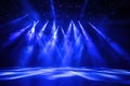 Stage with dynamic LED lighting and theatrical haze atmosphere Royalty Free Stock Photo