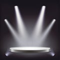 Stage, empty round podium illuminated by spotlights