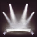 Stage, empty round podium illuminated by spotlights