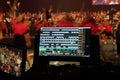 Stage lighting control screen in front of dancers