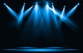 Stage lights. Blue spotlight strike through the darkness. Royalty Free Stock Photo