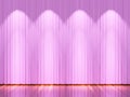 Stage with pink curtains and spotlight.