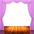 Stage with pink curtains and spotlight.