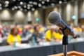 Stage ready microphone in a conference hall ready for a important speech Royalty Free Stock Photo