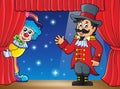 Stage with ringmaster and lurking clown Royalty Free Stock Photo