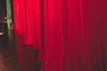 Stage with velvet red curtain in theater cinema, empty old-fashioned elegant theatre wooden stage with red cloth drapes curtains Royalty Free Stock Photo