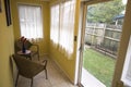 Staged light colored sunroom for residential real estate