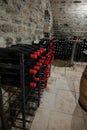 Stages of wine production from fermentation to bottling, visit to wine cellars in Burgundy, France. Aging in bottles Royalty Free Stock Photo