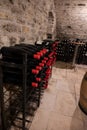 Stages of wine production from fermentation to bottling, visit to wine cellars in Burgundy, France. Aging in bottles Royalty Free Stock Photo